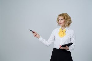 Woman with tablet and pen