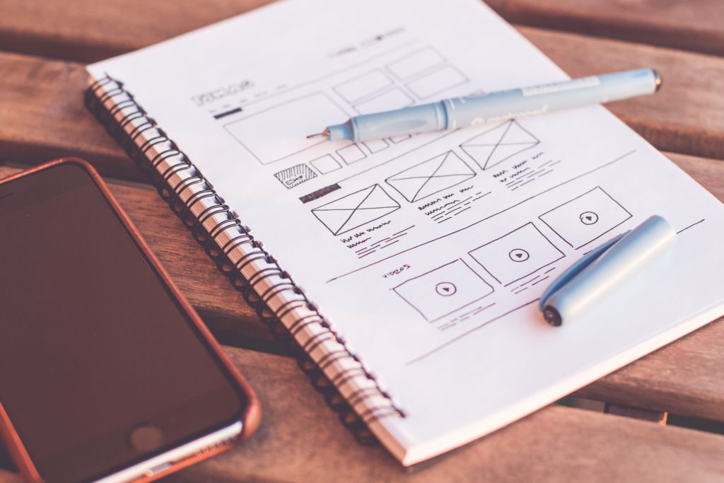 notebook , smartphone and pen 