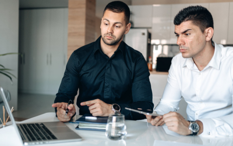 men using a laptop