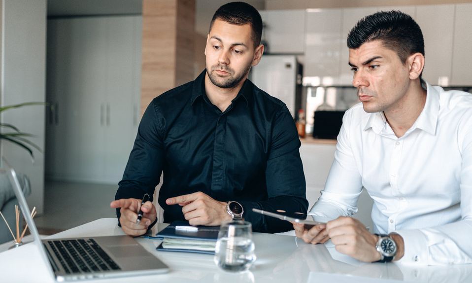 men using a laptop